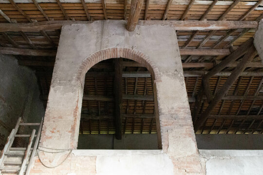 Internal details of an old working shed for agriculture, Italy