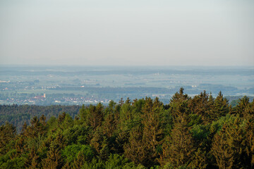 dark clouds and thunderstorm in the Bavarian Forest with bright sheet lightning