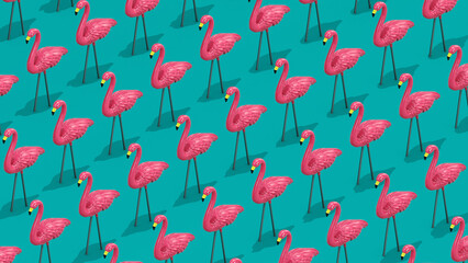 3D Trendy retro Summer pattern of a flock of isometric pink flamingo yard ornament walking downward on teal background © Jon Buckley
