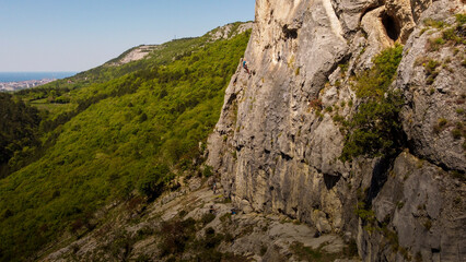 Fototapeta na wymiar stone climbing wall in italy