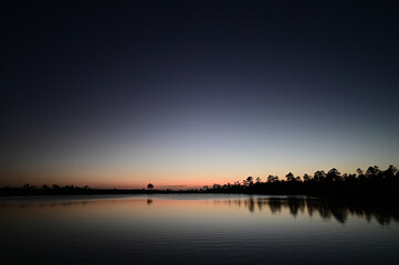 Twilight over Pine Glades Lake in Everglades National Park, Florida on calm clear April evening.