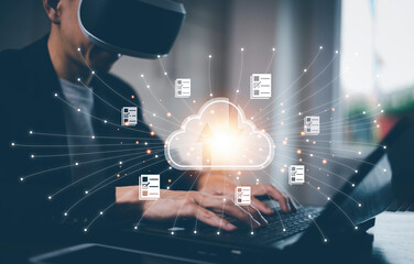 Man wearing VR glasses virtual using tablet with data information on the Cloud Computing Technology Internet Storage Network,  big data Through internet technology, Cloud sharing download and upload