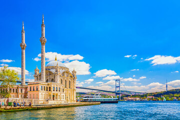 The Bosphorus Bridge and the Ortakoy Mosque during summer sunny day in Istanbul, Turkey