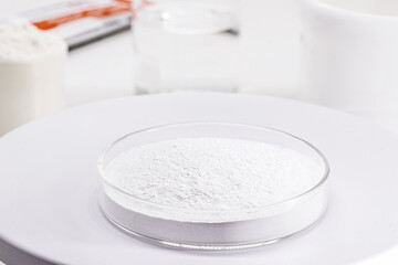 petri dish with crude Benzoyl Peroxide, used in the preparation of cream, lotion or gel in the...
