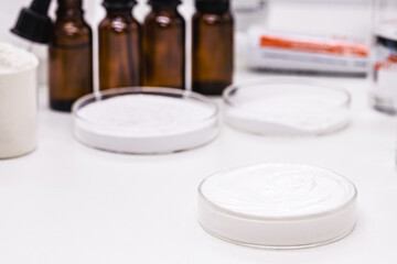 Petri dish with Benzoyl Peroxide cream, used in the preparation of cream, soap, lotion or gel in...