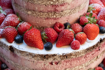 Two-tiered original cake with lots of strawberries