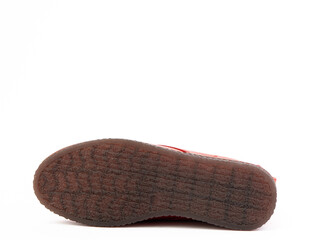 Sole for shoes, bottom view. brown shoe sole close-up isolated on white background. place for text. Element of boots. Concept of production of shoe.