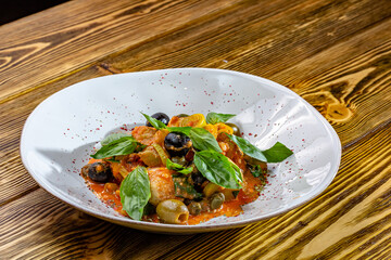 Juicy meatballs of turkey meat with vegetables zucchini, eggplant, olive, tomato