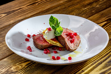 Marbled beef minion steak fried properly so that the middle is pink