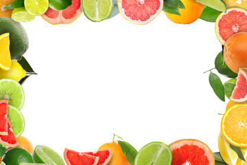 Frame made of many fresh citrus fruits on white background with space for text