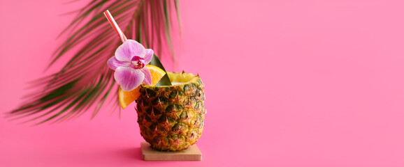 Tasty Pina Colada cocktail on pink background with space for text