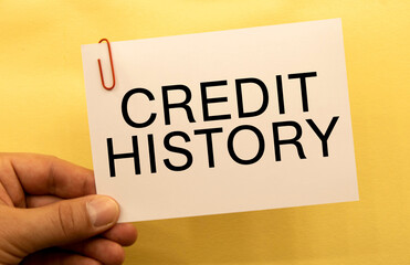 Credit History. text on white paper on wood table background