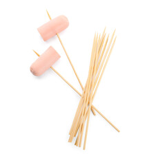 Wooden skewers with sausage on white background