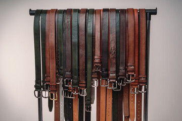 Lots of handmade belts on the counter