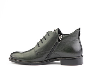 Men's autumn green leather jodhpur boots with laces and average heels, isolated white background. Left side view. Fashion shoes.