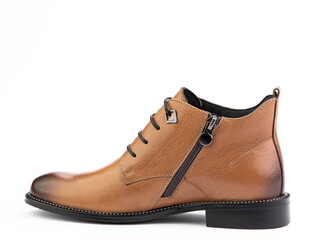 Men's autumn brown leather jodhpur boots with laces and average heels, isolated white background. Left side view. Fashion shoes.