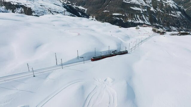 Swiss beauty, a rack railway going to Gornergrat train station under breathtaking Matterhorn, Zermatt, Valais, Switzerland, Europe. A train through Switzerland.