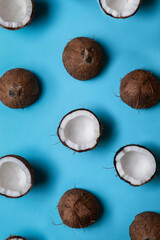 Open coconuts on the blue background.