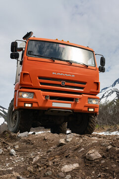 Expedition off road passenger truck KamAZ 43118 on mountain road on background of volcanic landscape. Exterior of Russian commercial vehicle 6x6 chassis. Kamchatka Peninsula, Russia - June 20, 2020.