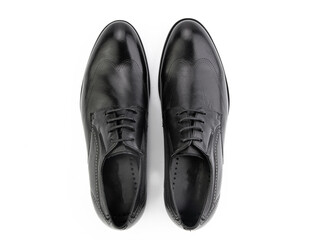 A pair of classic leather elegant men's shoes isolated white background. Groom's stylish black shoes. Isolated object close up on white background.