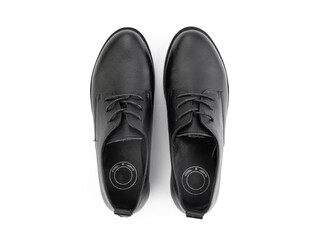 A pair of classic leather elegant men's shoes isolated white background. Groom's stylish black shoes. Isolated object close up on white background.