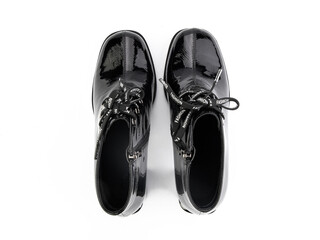 black leather jodhpur boots isolated on white background. Top view. Fashion shoes. Photoshoot for shoe shop concept.