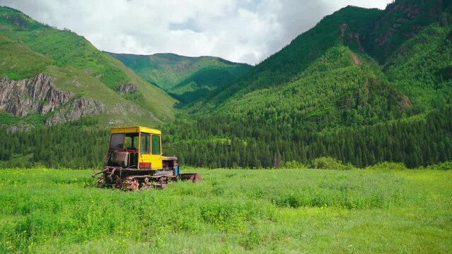 An old bulldozer in the mountains of Russia