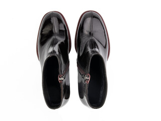 black leather jodhpur boots isolated on white background. Top view. Fashion shoes. Photoshoot for shoe shop concept.