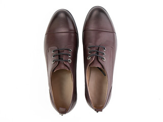 A pair of classic leather elegant men's shoes isolated white background. Groom's stylish black shoes. Isolated object close up on white background.