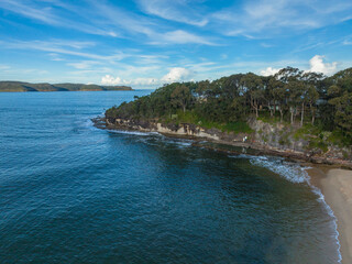 Aerial afternoon seascape with scattered high cloud