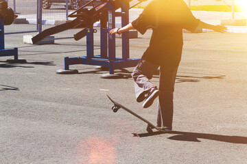 Skateboarding on the track. Tricks on a skateboard.