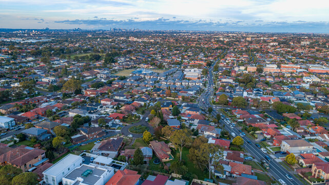 Aerial drone photo of a residential neighbourhood in Sydney Australia at sunset