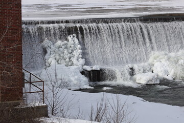 frozen snow covered rocky winter river