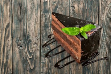 Appetizing creams cake on  with sugar powder on plate.