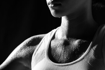 Asian Tan Skin Sport Girl in Fitness Bra, exercise sweat water drop in low key exposure lighting - obrazy, fototapety, plakaty