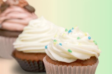 Tasty sweet chip muffins on light background.