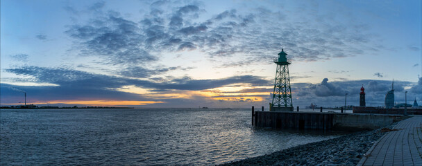 scenic sunset panorama behind a historic lighthouse in Bremerhaven, Germany
