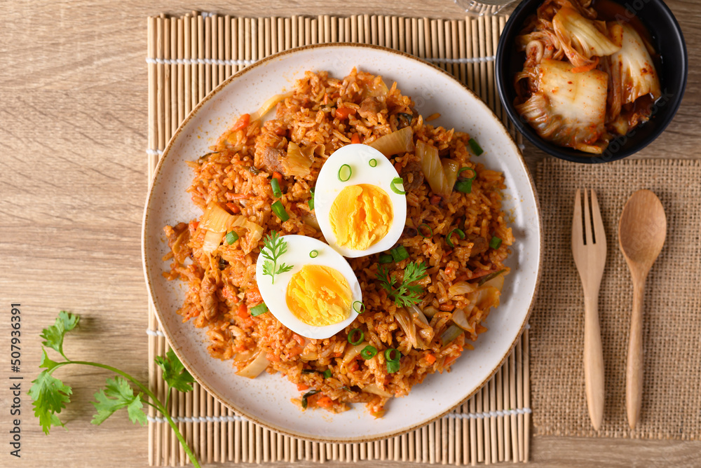 Canvas Prints korean kimchi fried rice with boiled egg on wooden table