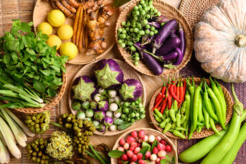 Organic Southeast Asian vegetables and spices from local farmer market in Thailand, Sustainability concept, Table top view