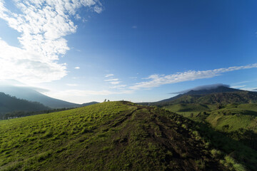Crater with views over grasslands and seasonal wildflowers, popular for mountain and dirt-bike trails. Margahayu, Kalianyar, Kec. Ijen, Kabupaten Bondowoso, Jawa Timur, Indonesia