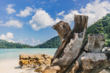 Chicken and Turtle rocks on the beach of Mu Ko Surin national park Thailand.