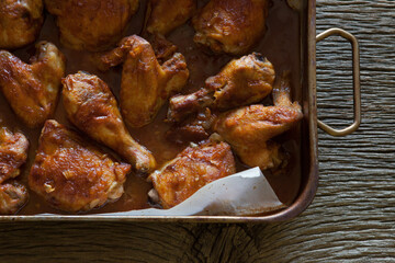 Baked Marinated Chicken Wings, Breasts and Thighs in Roasting Pan