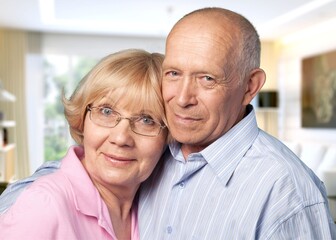 Portrait of happy beautiful senior family couple in love smiling at camera,