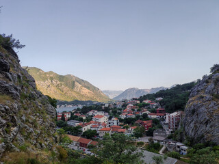 Fototapeta na wymiar View from above on Kotor bay on old town, sea and mountains in Kotor, Montenegro