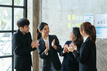 Business People Team Applauding Achievement Concept, Happy business team applauding after successful group meeting.