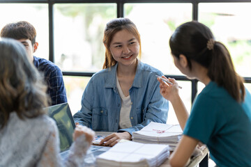 ฺBusinesswoman leaders in office meeting room, Group of a young business people discussing business plan at modern startup office building.