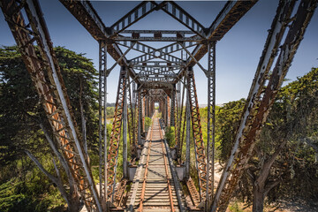 Fototapeta premium Abandoned Train Tracks Bridge Through Salinas River California