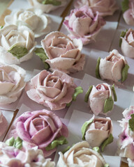 Homemade marshmallows in shape of rose flowers. Zephyr flowers.