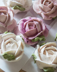 Homemade marshmallows in shape of rose flowers. Zephyr flowers.