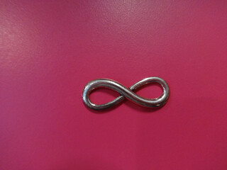 Infinity Symbol on a Pink Background